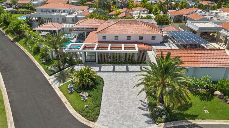 Redefine luxury stepping into a world of connectivity in this exquisitely detailed two-story residence, furnished and equipped, located in the coveted Sabanera Dorado community. 

Curated design and furniture: The Creators.

Pili & Co, a local acclaimed luxury interior design firm, just finished this residential masterpiece.  The staff did an incredible job, from the furniture fine selection from The World of RH: Restoration Hardware to the finishes from floor to ceiling. All the elements and accessories were well-sought and inspired by the enjoyment of the family. Duo Construction, a well-known local construction firm, was a crucial key to converting this residence into an art piece. The detail-oriented staff polished every corner of this jewel.  The supervision and the selection of materials are evident. 

Spacious Living for the Whole Family

Meticulously crafted around what it means to live an elevated lifestyle, this 10,274 -square-foot residence is fully furnished, fully equipped, and designed with exceptional attention to detail, offering soft color palettes and instant satisfaction from the moment you enter.
This expansive property features 4,319 sq ft of Air Conditioning space with 4 bedrooms, each with ample space and comfort and their en-suite bathroom, and 5 elegantly designed bathrooms. The home’s open layout creates an inviting atmosphere, perfect for family living and entertaining. With a porte-cochere and a two-car garage featuring additional storage space, the residence seamlessly blends style with functionality.

Sustainable and Energy-Efficient Features

Sustainability and innovation are at the heart of this home. Equipped with a Cummins Onan 40Kw generator, a 12kW solar panel system, water cisterns, and a water filtration system, this property ensures uninterrupted comfort and eco-conscious living. Energy-efficient features, such as the inverter air conditioning system and Storm King PVC security windows, keep the home both safe and comfortable year-round.

State-of-the-Art Kitchen and Outdoor Entertainment

The heart of this residence lies in its state-of-the-art kitchen, featuring Thermador panel-ready appliances, custom Wood Studio cabinetry, a spacious pantry, and an enclosed coffee nook. Whether hosting a lavish dinner or a casual family meal, the outdoor BBQ area and poolside bar are perfect for entertaining, complete with a Fire Magic BBQ, wine and expensive beer coolers, and the pool with perfect proportions with heated jacuzzi for relaxation. 

Bonus Features for Added Luxury

In addition to its stunning design and sustainability, this residence offers exclusive extras for the ultimate lifestyle. Enjoy the dedicated playroom/poolroom, perfect for family entertainment, a versatile bonus loft ready to be transformed into an office, gym, or extra living space, and a 6-seater golf cart for effortless mobility around the community. These thoughtful additions make this home as functional as it is luxurious.