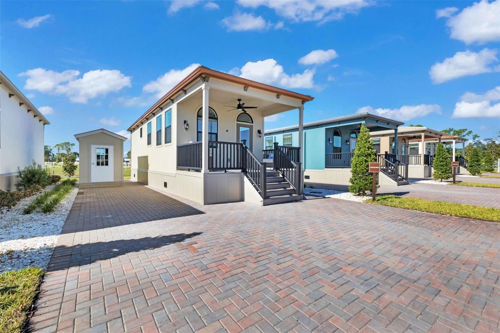 Photo of 6165 Talon Bay Drive #140, North Port, FL 34287 (MLS # TB8469213)