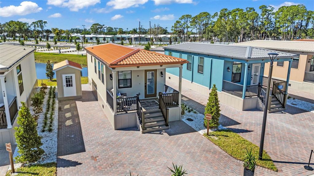 Photo of 6165 Talon Bay Drive #140, North Port, FL 34287 (MLS # TB8469213)