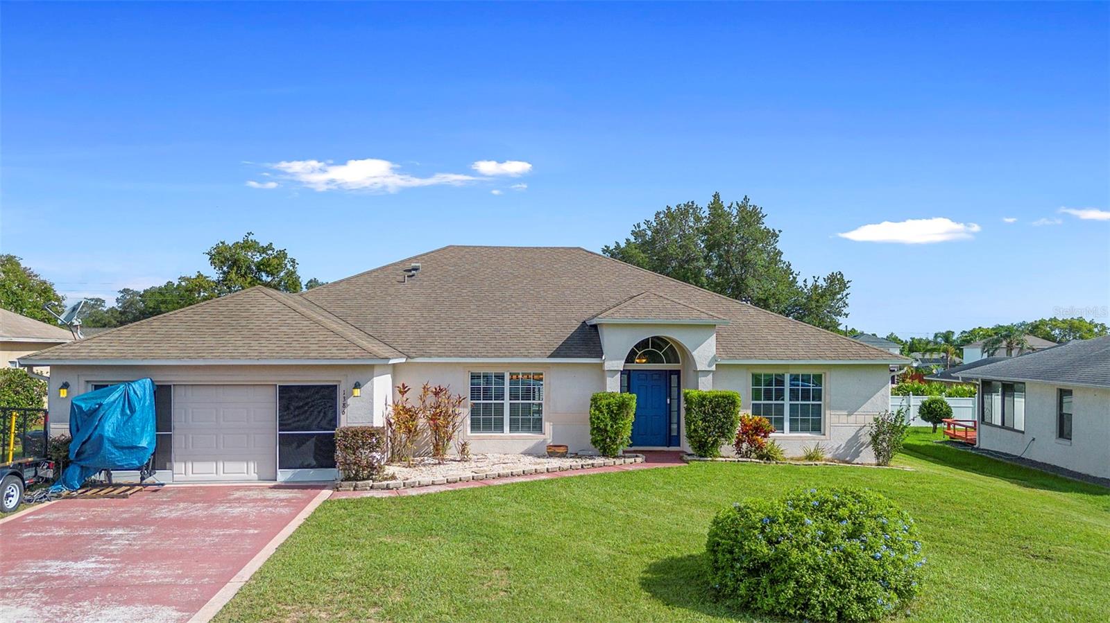 This 4-bedroom 2-bath split floor plan pool home with great “bones” is in a perfect location tucked away just a short distance from Publix, restaurants, and I-4. Upon entering this beautiful home, the soaring ceilings set the stage, with a large bonus room on one side and a formal dining area on the other. The huge kitchen includes all stainless-steel appliances, two reach-in pantries, recessed and pendant lighting, an abundance of storage, and it sits adjacent to the living area. The main living with vaulted ceilings area is open to the kitchen and boasts an abundance of natural lighting and flows to the large, screened lanai and swimming pool area. The huge 15’ X 15’ primary bedroom features private rear lanai access, a huge walk-in closet, and an ensuite bath with dual vanities, water closet, and a garden tub. Additional features include a huge driveway for plenty of parking, storage shed in the fenced back yard that stays with your new home, a brand-new variable-speed pool pump in 2024, the washer and dryer in the indoor laundry room stay, and the pool and screen enclosure were added in 2015. Located conveniently midway between Orlando and the beaches, this location couldn’t be better. Ask your Realtor® for the unbranded virtual tour of this amazing home. All measurements are approximate and should be independently verified.