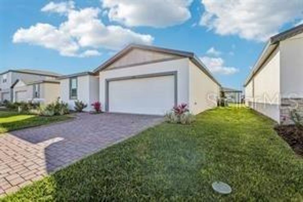 Photo of 894 Sand Sea Place, Haines City, FL 33844 (MLS # O6398202)
