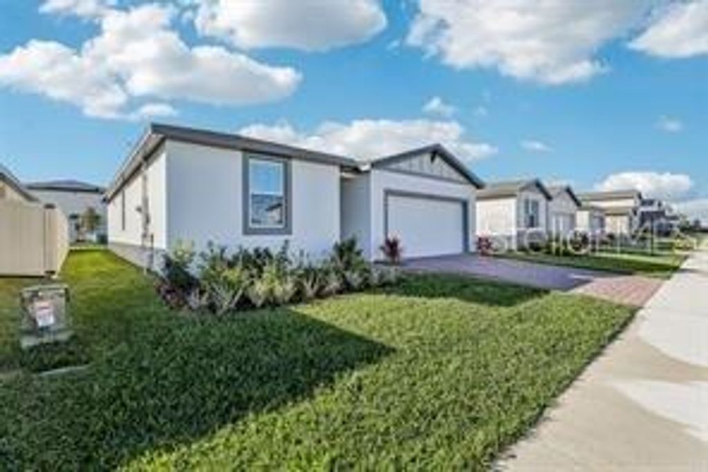 Photo of 894 Sand Sea Place, Haines City, FL 33844 (MLS # O6398202)