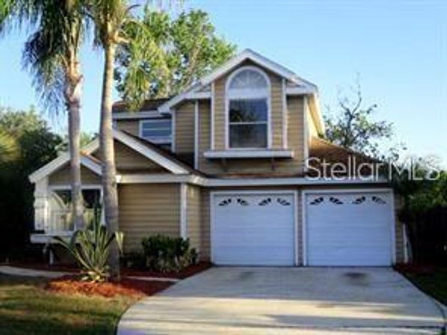 PRICE REDUCED!!!Located in the Ease side of orlando in the Surrey Ridge community you have this 3 bed 2 bath 2 car garage two-story house with over 1200 sq of living space. The downstairs floor plan has the master bedroom, a large living room , kitchen that flows into the dining room with sliding glass doors opening up to the patio. Upstairs you have the laminated wood 2 bedrooms and the second bath. Outside you have an open wood patio with no rear neighbors.wonderful location convenient to the 417/408 toll roads, Valencia East college, UCF and waterford lakes towne center for a variety of shopping and restaurants.