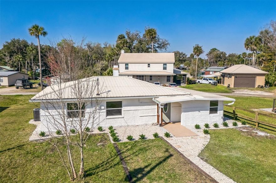 Experience the perfect blend of modern comfort and natural Florida beauty at 9400 NE 307th Ct in Fort McCoy.
This beautifully remodeled 3-bedroom, 2-bath home sits just moments from Lake George and offers peaceful, secluded living surrounded by the Ocala National Forest.
Inside, you’ll find a completely refreshed interior featuring stainless steel appliances, a cozy wood-burning fireplace, and convenient laundry hookups. Recent upgrades include new French drains, a new septic pump, a brand-new AC system, and a newer metal roof, offering durability and peace of mind for years to come.
Enjoy scenic lake views and access to a private boat ramp with an optional HOA membership—perfect for boating, fishing, and lakefront adventures. Nature lovers and outdoor enthusiasts will appreciate the tranquility and endless recreation this setting provides.
Located just minutes from downtown Salt Springs, you’ll have easy access to shops, restaurants, and gas stations while still enjoying a private, tucked-away environment.
Currently tenant-occupied, this property provides rental income from day one—making it an excellent investment opportunity or future personal retreat.