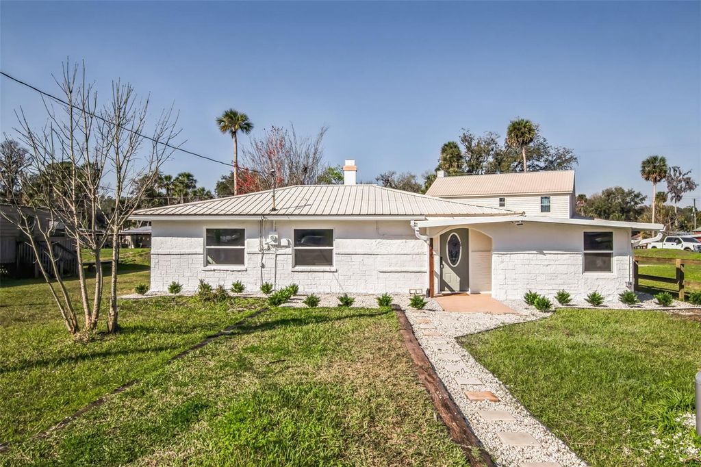 Photo of 9400 NE 307th Court, Fort Mccoy, FL 32134 (MLS # O6365638)