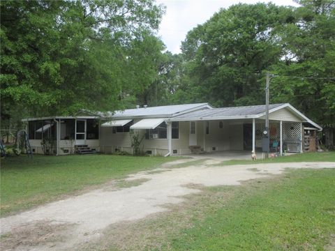 Photo of 10055 E Highway 316, Fort Mccoy, FL 32134 (MLS # OM698573)