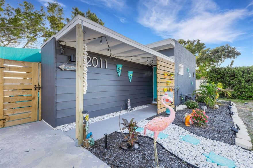 You are going to fall in love with this charming, updated gem in Bayshore Gardens! This lovely home features 2 bedrooms, 1.5 baths, a comfortable living room, a bright kitchen, and a generously sized flex room—perfect as a dining room (as it’s currently used), office, hobby space, workout room, or whatever best fits your lifestyle.

Enjoy peace of mind with major improvements already done for you, including a newer roof (2019), tankless water heater, stainless-steel appliances, and mostly updated bathrooms. The abundance of windows fill the home with natural light, creating a space that feels both cozy and open. Flooring is easy to maintain—tile throughout, with laminate in the flex/dining room. Just outside the back door is a separate laundry area with extra storage, keeping things convenient and out of the way.

If outdoor living is what you’re after—this home delivers! The large, fully fenced backyard includes a fire pit, storage shed, and plenty of room to add a pool. The photos show just how versatile and enjoyable this space can be for gatherings, relaxing, or creating your own backyard oasis.

Living in Bayshore Gardens comes with fantastic amenities for residents, including a community pool, park and playground, boat ramp, fishing pier, kayak storage, tennis/pickleball and basketball courts, and a recreation center. All of this is included in the annual Bayshore Gardens Park and Recreation District fee, conveniently part of your tax bill ($427). No other CDD or HOA. Residents also have access to a community marina, offering boat slips and a launch at discounted rates for residents (based on availability).

All of this—and you’re close to everything...10-15 minutes to the beach, close to shopping and all there is to do in Bradenton and Sarasota.

This wonderful home is the complete package. Don’t miss your chance to see it!