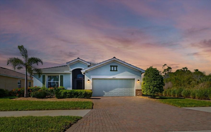 Welcome to this beautifully updated, move-in ready pool home offering 3 bedrooms and 2 bathrooms in the highly sought-after gated community of Stoneybrook at Venice.

A screened front entry allows you to enjoy fresh air without the nuisance of insects. Inside, you’ll immediately notice soaring ceilings with crown molding and an abundance of natural light that enhance the home’s open, airy feel. Diagonally laid tile flooring flows throughout every room, creating a clean, modern aesthetic and a seamless sense of space.

The kitchen serves as the heart of the home, thoughtfully designed for both everyday living and entertaining. It features granite countertops, a stylish tile backsplash, pendant lighting over the island, a reverse osmosis system, top-of-the-line Bosch appliances imported from Germany, a spacious pantry, and a generous dinette area. The kitchen opens effortlessly into a large dining room and living area, forming a cohesive open floor plan. Sliding glass doors lead out to the screened lanai and heated pool—perfect for indoor-outdoor Florida living.

The private primary suite is tucked just off the living room, separate from the two additional bedrooms. It offers a large walk-in closet and a well-appointed en suite bathroom with dual vanities, a garden tub, a walk-in shower with a new glass enclosure, and a private water closet. The secondary bedrooms are generously sized and share a full bath.

This home has been meticulously maintained and extensively updated, including fresh interior and exterior paint (2026), updated landscaping with river rock (2022 and 2024), a custom lanai awning (2023), a Culligan whole-house water softener (2024), full lanai rescreening (2025), Storm Smart shutters on all doors and windows (2023), a new hot water heater (2023), and a new washer and dryer (2022). Additional enhancements include attic flooring with aluminum pull-down stairs, a whole-house surge protector, upgraded 30-amp garage outlets, enhanced fiber/internet systems, a screened front enclosure, a rain barrel water collection system, and an easily accessible and thoughtfully positioned underground filter for the irrigation system.

Stoneybrook at Venice is a gated, amenity-rich community with low HOA fees, an on-site manager, and a welcoming, active atmosphere. Residents enjoy access to a state-of-the-art clubhouse and fitness center, resort-style pool and spa, tennis and pickleball courts, basketball, volleyball, playgrounds, horseshoe pits, a baseball/softball field, and a multi-purpose court, along with a full calendar of social events.

Conveniently located near I-75, downtown Venice, Sarasota Memorial Hospital, shopping, dining, top-rated Sarasota County schools, Gulf Coast beaches, the Atlanta Braves spring training facility, and Wellen Park—this home offers the perfect blend of comfort, convenience, and the ultimate Florida lifestyle.