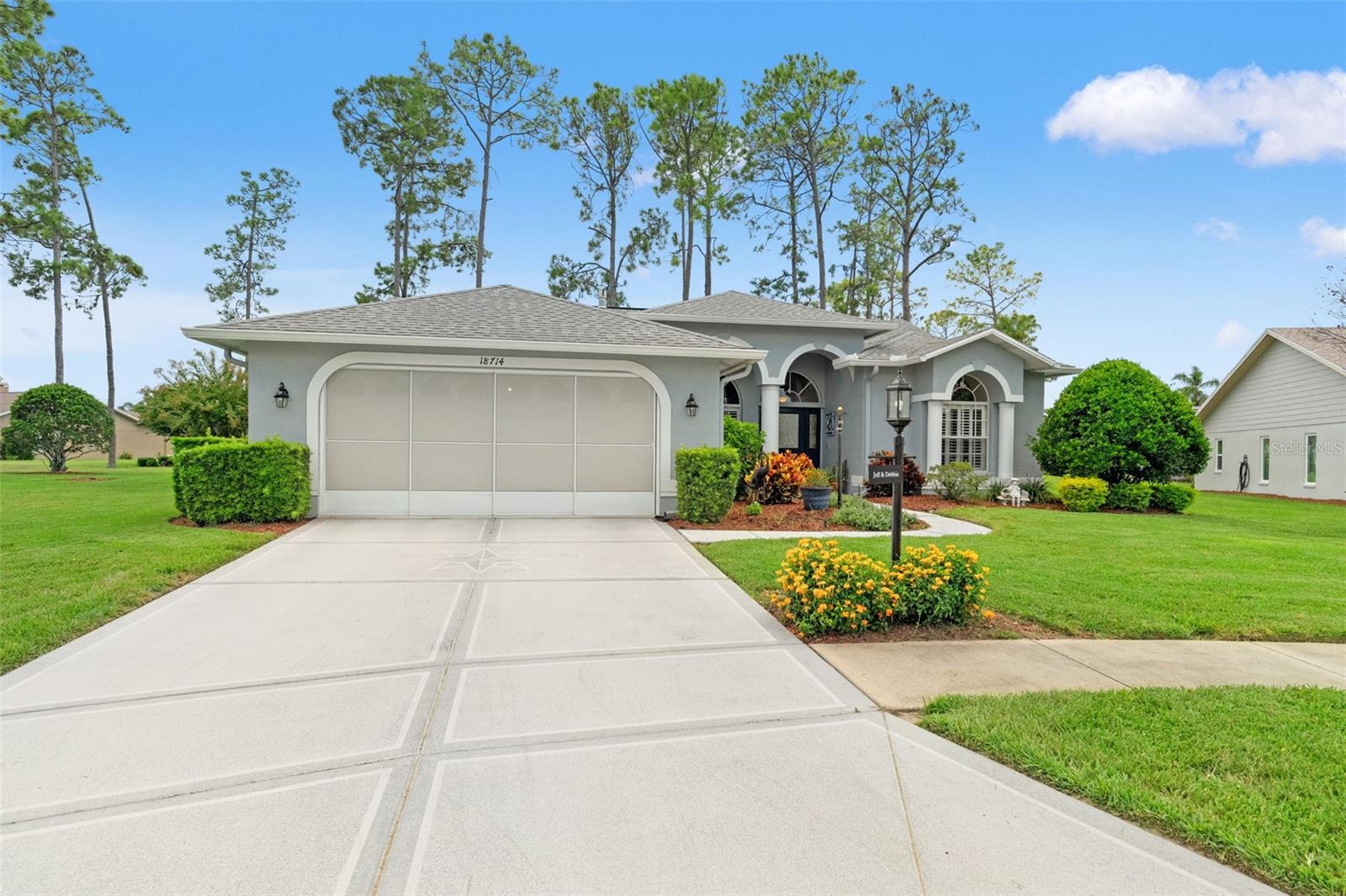 Exquisite Golf Course Living in Heritage Pines – Pasco County’s Premier 55+ Gated Community.
Step into refined elegance with this beautifully appointed three-bedroom, two-bathroom residence located in the prestigious, guard-gated community of Heritage Pines. Perfectly positioned on one of the community’s largest lots on a Cul-de-sac, this home combines timeless upgrades with a lifestyle of comfort and sophistication.
The spacious family room boasts a cozy gas fireplace and flows seamlessly into the formal dining area—ideal for hosting memorable gatherings. The fully remodeled kitchen is a culinary dream, showcasing solid wood cabinetry, gleaming granite countertops, sleek black stainless-steel appliances, and a generous eat-in nook with serene views of the lush backyard.
The owner’s retreat is a private haven, featuring two oversized closets and a luxurious en-suite bath with a soaking tub, a beautifully tiled walk-in shower, dual vanities, and abundant built-in storage. A thoughtfully designed split floor plan ensures privacy for guests, while the fully enclosed Florida room under A/C offers over 200sqft year-round living space for relaxing or entertaining.
The oversized garage is equipped with a side door for golf cart access, making it effortless to enjoy a sunset ride to the clubhouse for dinner. Out back, a pavered patio overlooks the 8th hole of the immaculate 18-hole golf course, providing an unbeatable backdrop for morning coffee or evening wine.
Heritage Pines offers resort-style amenities, including an 18-hole golf course, full-service restaurant, grand clubhouse, community pool, pickleball and tennis courts, fitness center, and a full calendar of activities. Perfectly situated along County Line Road, this community is just minutes from US-19, top dining, shopping, and medical facilities.
This turnkey home is more than just a place to live—it’s a lifestyle.