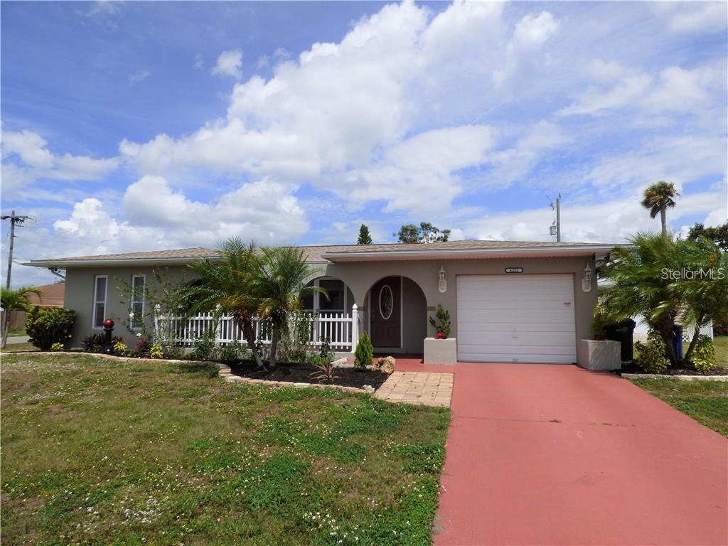 Turnkey Furnished 3-Bed, 2-Bath Pool Home on Oversized Corner Lot! This beautifully maintained home is move-in ready—perfect as a full-time residence or vacation retreat. Step inside to an open floorplan that blends comfort and style, featuring updated flooring throughout and a spacious living area with a stunning floor-to-ceiling window that fills the space with natural light.
The kitchen is a chef’s delight with granite countertops, ample cabinetry with roll-out shelves, and a large window that overlooks the sparkling pool. Adjacent, the open dining area offers sliding glass door access to the screened lanai, where you’ll find a fully equipped outdoor kitchen with running water and a gas fireplace—ideal for entertaining or relaxing poolside. The private primary suite boasts a large updated bathroom, generous his-and-her closets, and direct access to the pool area through sliding glass doors. Two additional bedrooms are smartly designed with Murphy beds, providing flexible use as guest rooms, home offices, or hobby spaces. Storage is abundant throughout, including a large outdoor workshop/storage building. Ideally located close to shopping, dining, medical facilities, and with easy access to US 41, I-75, and the stunning beaches of Southwest Florida—this home truly has it all!
**Photos are prior to current tenant occupying the property. Revised photos will be added when tenant vacates on July 31.**