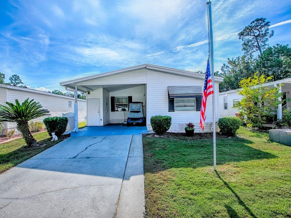 Photo of 730 Cottage Park Lane, Leesburg, FL 34748 (MLS # G5104720)