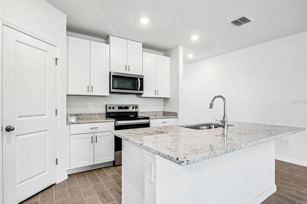 Photo of 1740 Brekey Way, Zephyrhills, FL 33541 (MLS # O6311916)