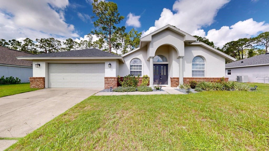 Photo of 20 Russell Drive, Palm Coast, FL 32164 (MLS # FC321370)