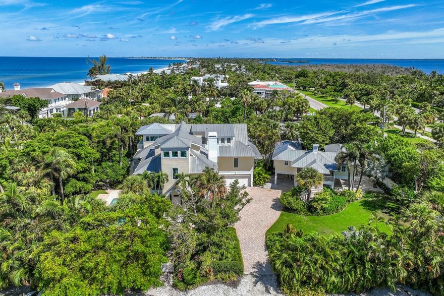 Welcome to 2021 20th Street, Boca Grande, FL! A Family Compound close to the Village on a Private Street with deeded Beach access! Nestled on over half an acre on a Private street in the heart of Boca Grande, 2021 20th Street offers the perfect setting for family gatherings where memories are made. This one of a kind property boasts a large 5 bedroom main home and a charming 3 bedroom guest cottage. The tropical setting provides an ideal backdrop for family gatherings, vacations, and creating cherished moments for generations to come. The spacious main home features an open and airy floor plan with high ceilings, a European designed kitchen,large windows, and lots natural light, offering a seamless flow between indoor and outdoor living. Whether you’re hosting family dinners, relaxing by the pool, or gathering for sunset cocktails on the patio, the home's inviting atmosphere fosters connection and togetherness. Surrounded by tropical landscaping, the property ensures privacy while offering plenty of room for outdoor activities and relaxation. For guests or extended family, the delightful 3-bedroom guest cottage provides a perfect retreat with its own kitchen, living area, and comfortable, coastal-inspired design. This separate dwelling allows for privacy and comfort, while keeping everyone close together on the same property. The cottage is also perfect for use as a rental for those owners desiring income to offset the expenses of Island home ownership. One of the standout features of this compound is its deeded beach access, granting direct entry to Boca Grande's beaches. Imagine waking up to the sound of waves, walking down to the beach with loved ones, or enjoying a sunset stroll along the shore—this property gives you the luxury of beach living just steps from your door. The expansive lot provides ample space for family activities, outdoor games, or simply enjoying the tropical surroundings. Whether you're hosting a holiday gathering, a summer barbecue, or a quiet evening with family, this home is designed for lasting memories. With its prime location in Boca Grande, this property offers the perfect balance of seclusion and convenience, just a short distance from the island's charming shops, restaurants, community center, and bike path.