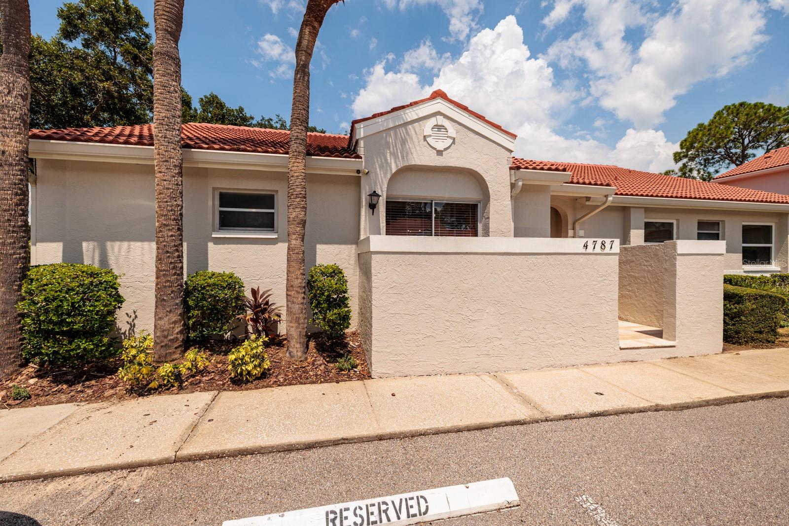 PERFECT in Placido Bayou RENTAL ~ Location, Location, Location! Fall in LOVE with this UNIQUE UPDATED, villa-style 2 bedroom 1.5 bathroom RENTAL CONDO in the BEAUTIFUL EXCLUSIVE GATED Community of PLACIDO BAYOU ~ one of the BEST locations in Pinellas County! YOU WILL LOVE the maintenance free living in this community situated in the Northeast Placido Bayou Neighborhood! YOU WILL LOVE this RENOVATED Rental Condo! LOVE the abundance of natural light in this spacious 2 bedroom and 1.5 bathroom Condo with BEAUTIFUL PRIVATE BACKYARD PATIO VIEWS. Enjoy the spacious living/dining room combo area that is welcoming and provides a wonderful space to relax while enjoying company in the large kitchen. The UPDATED OPEN kitchen offers granite countertops, stainless-steel appliances and a breakfast bar. Enjoy the laundry closet located in the kitchen with stackable washer and dryer. YOU WILL LOVE the spacious Primary Bedroom with an en suite bathroom. The en suite bathroom offers a large vanity with a granite countertop, walk-in shower, and large custom walk-in closet. The 2nd Bedroom, which offers additional square footage, has a great view of the private backyard. Enjoy the private peaceful backyard that is completely fenced-in and offers easy maintenance artificial turf and pavers. This perfect family home has everything you could want from tile roof, open floor plan, vaulted ceilings, NEW light fixtures, NEW ceiling fans, GRANITE COUNTERTOPS, UPDATED bathrooms and much more! This home is open and inviting ~ allowing the chef to be part of the activity. Enjoy having an assigned parking spot and plenty of guest parking. The Rent fee includes ~ water, sewer, trash removal, CABLE TV, internet, exterior maintenance on building, lawn maintenance, 24 hr GATED security, and community pool! Enjoy renting this maintenance free lifestyle of living! Placido Bayou is one of the BEST locations offering quick access to DOWNTOWN ST. PETE, airports, beaches, interstates, shopping, and restaurants. YOU MUST SEE this little bit of Florida Paradise in this Guard Gated MAINTENANCE FREE COMMUNITY!