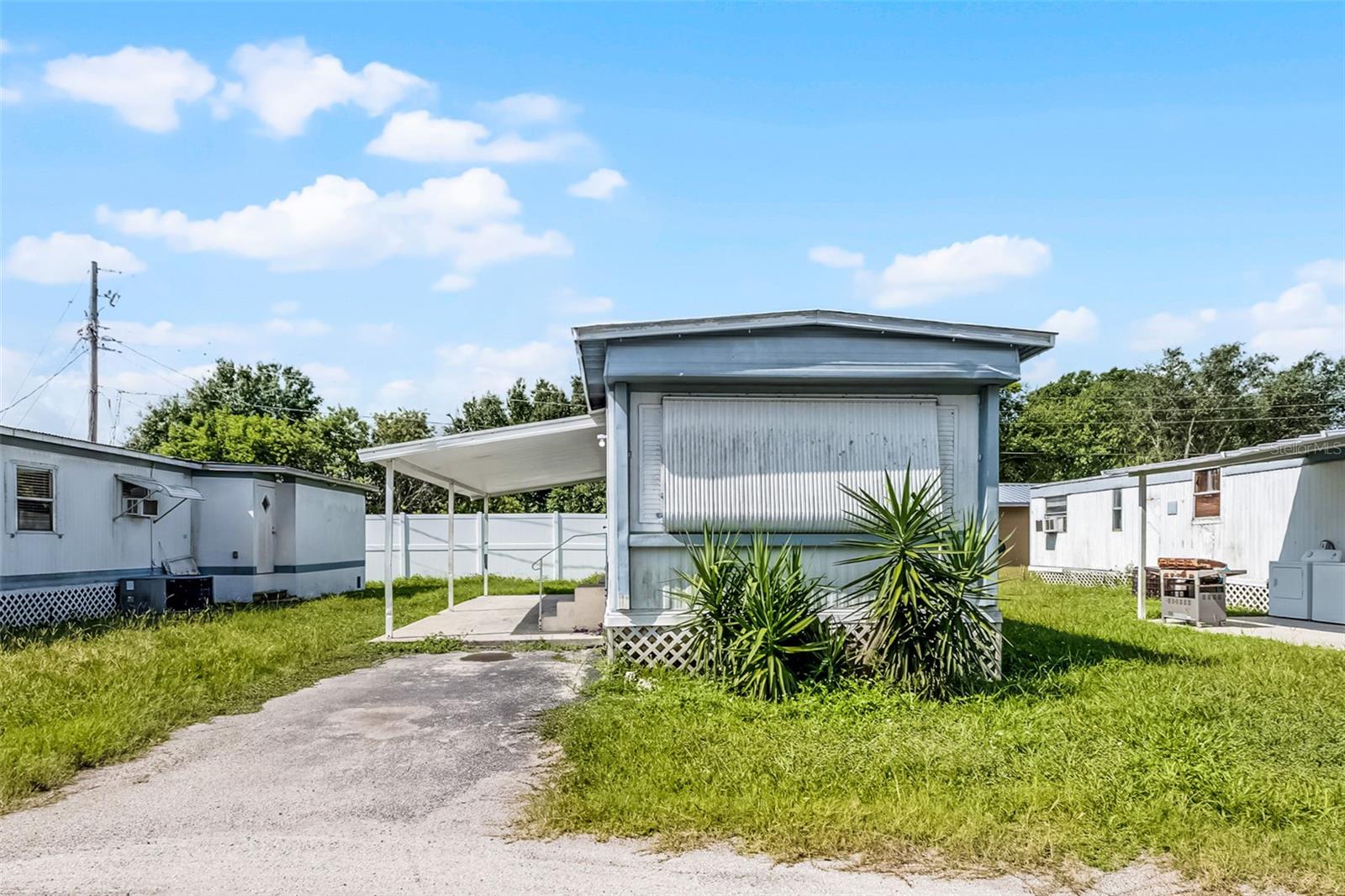 Welcome to 2854 Lake Alfred Road, Unit 11 – a beautifully updated 2-bedroom, 1-bath mobile home offering comfort, convenience, and modern touches throughout. Step inside to find a freshly updated interior featuring stylish finishes, new flooring, and an open layout that maximizes space and natural light.
$50.00 montly fee for water, garbage and sewer
The kitchen is equipped with sleek stainless steel appliances, including a refrigerator and stove, making meal prep a breeze. Enjoy the added convenience of washer/dryer hookups and a private, covered patio—perfect for relaxing or entertaining outdoors.
Additional perks include an assigned parking space right in front of your unit and a quiet, well-maintained community atmosphere. Don’t miss out on this affordable and move-in ready rental!
Contact us today to schedule a private showing!
Pet Policy --One Dog of 35lb or less (full grown size) - NO AGGRESSIVE BREEDS! Pet insurance is required as well as current vet records. A non-refundable pet fee and additional rent is required for an approve pet.
Failure to report any animal intended for residency will invalidate your application and immediately terminate your lease if you are selected.
YOU MUST TOUR THE PROPERTY PRIOR TO SUBMITTING AN APPLICATION. Application Process: You will be required to submit the following when you fill out your application: Driver's License/State ID, Income Verification, and pictures, if any, of your pet.
This must be done when you apply in order to proceed with your application. APPLICATION FEES ARE NON-REFUNDABLE AND APPLY TO EVERYONE 18+ YEARS OR OLDER.
We check: Credit (rental collections and utility collections are red flags) Rental history Employment Background (extent determined by HOA requirements) Gross income must meet or exceed 3 times the monthly rent to qualify for the property you are interested in. Example-Applicant must be able to prove $3000 gross income (verifiable) in order to qualify for home that rents for $1000 a month. What is provable income? A copy of your last pay stub or a letter from your employer will help in determining your income. Sometimes copies of your bank statement or your tax return, W2 forms or 1099 forms are necessary as well. Types of income include, Child Support, Spousal Support, SSI, Retirement and/or Disability, Wages, Parental Support and Student Financial Aid.
ALL APPLICATIONS ARE SUBJECT TO OWNER APPROVAL!