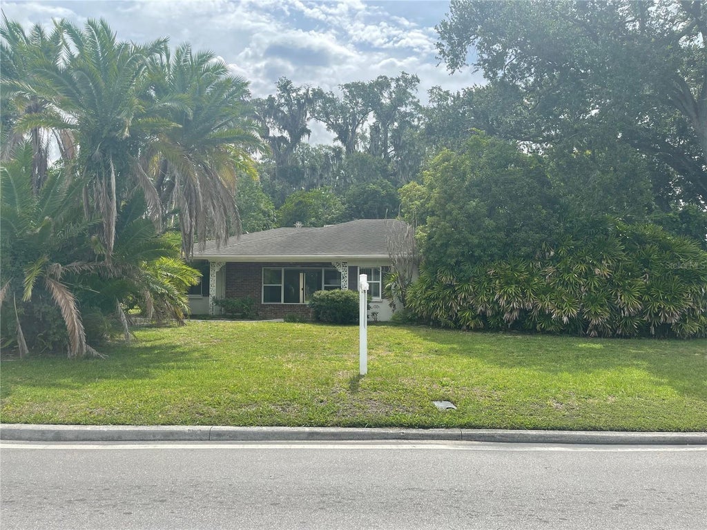 Photo of 225 Lake Hollingsworth Drive, Lakeland, FL 33803 (MLS # TB8543414)