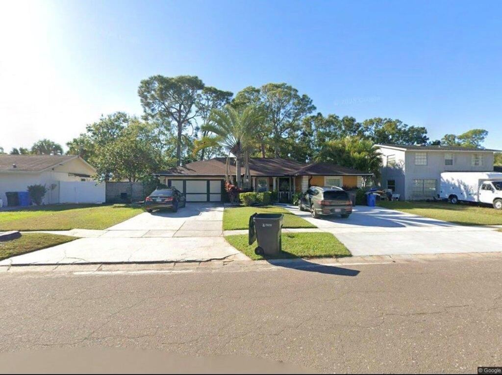 Photo of 7908 W Elm Street, Tampa, FL 33615 (MLS # TB8478477)