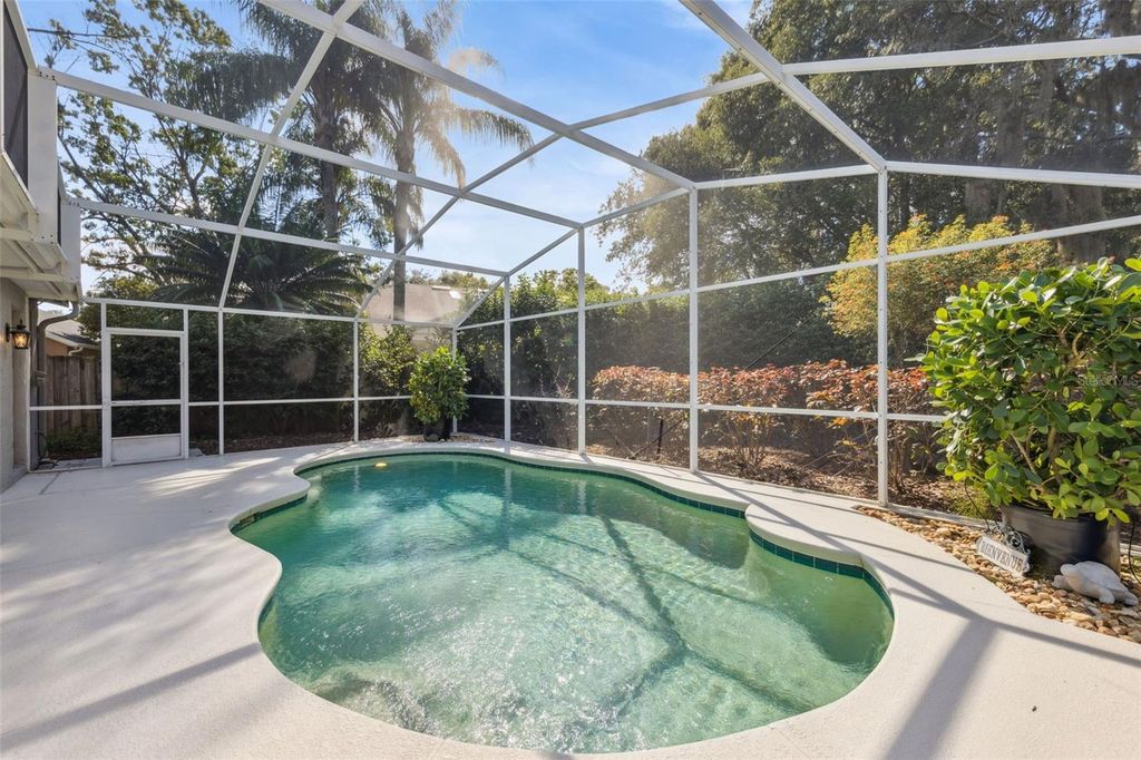 Photo of 1000 N Lake Claire Circle, Oviedo, FL 32765 (MLS # O6348554)