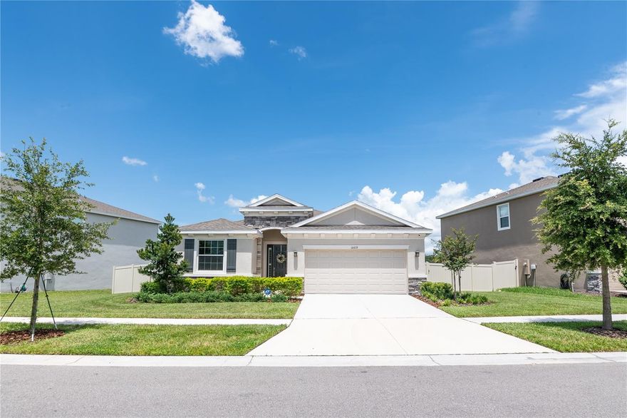 "Welcome Home" is what this home says to you! Built in 2023, this contemporary home is Southshore Bay is light, airy, and move-in ready! You'll enjoy a sense of flowing space of this 4-bedroom , 2.5-bathroom and 2-car garage D.R. Horton Preferred Series Lantana home, showcasing lofty 9'4" ceilings. 42" staggered mount kitchen cabinets with brushed satin hardware and crown molding, granite countertops throughout, stainless steel appliances, shower wall tile, and Home is Connected Smart Home System. In addition, this well designed home sits in a premium lot with a pond view, fenced-in yard and beautiful landscaping. Added features include luxurious Plantation shutters and elegant chandeliers in foyer, kitchen island, and dining area, and is equipped with a security system. Watch the beautiful sunrise and enjoy the pond view in your screened-in lanai. Southshore Bay is gated resort style community where residents enjoy its 5-acre crystal MetroLagoon, providing a myriad of water activities for all ages, including a family beach, splash pad, super-slide, paddle board and kayak, cabana and tiki, hub event pavilion and more! The community HOA assessments also include ULTRAFI, bundling Internet and Cable TV.  See it and you'll want it!
