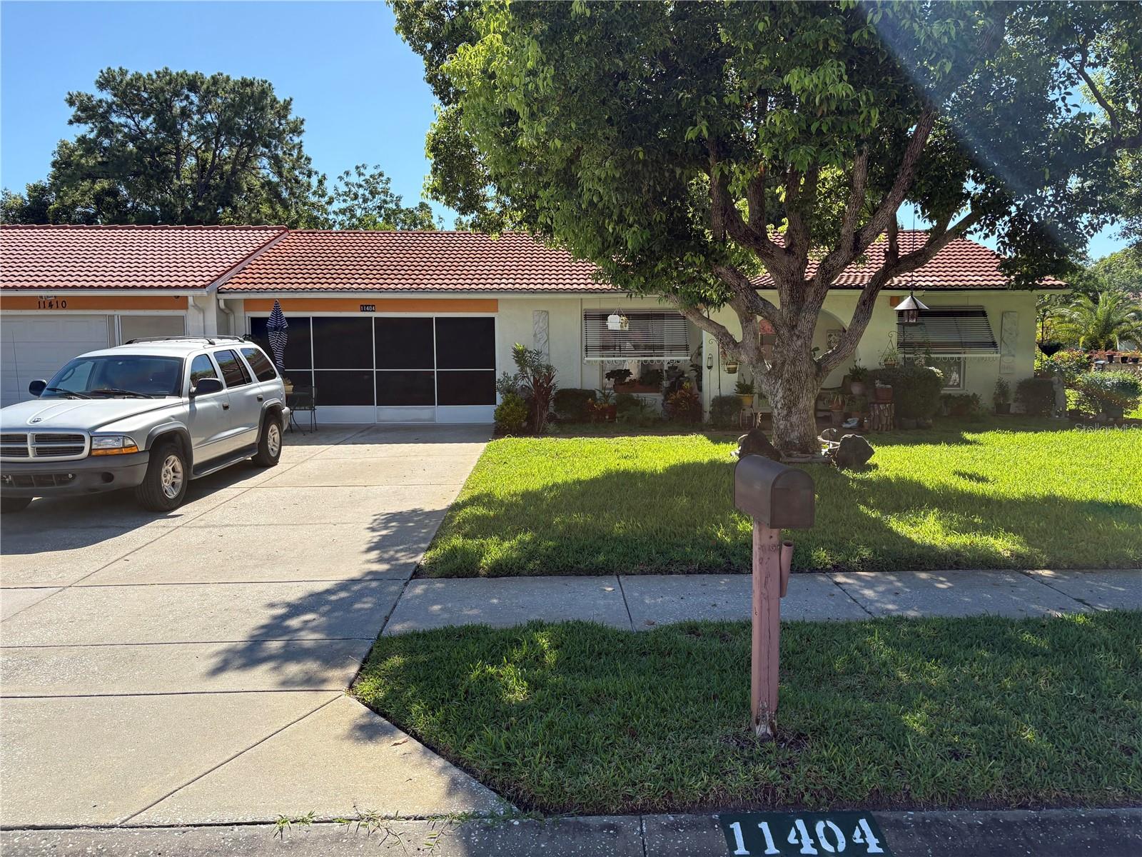 Don’t miss your chance to own this well-cared-for villa in the desirable 55+ community of Spanish Gates at Timber Oaks. Offering approximately 1,440 square feet of heated living space and 1,915 square feet under roof, this home features a split and semi-open floor plan with 2 bedrooms, 2 bathrooms, and a 2-car garage, plus a spacious extended sunroom—perfect for relaxing or entertaining.
This villa is being offered fully furnished, including an impressive collection of solid wood and high-quality pieces. The primary bedroom features a queen solid wood frame and mattress, solid wood dresser with mirror, matching armoire, two solid wood twin beds, a coordinating chest, chair, and nightstand. In the living room, you'll find a three-seat sleeper sofa, a matching double-recliner loveseat, three accent chairs, a leather-wrapped solid wood trunk, two floor lamps, a brand new 75” smart TV with matching TV stand, and more.
The dining area includes a rich solid wood table with six matching leather and wood chairs, plus a second high-top dining set with six stools—perfect for gatherings. Additional furnishings include a wood and metal pantry rack with glass-door compartments and drawers, a bar stand with wine rack, and a stunning three-piece solid wood wall unit (8’ wide x 6’ tall). Also included are two footstools, a solid oak computer desk (30”W x 42”H), a solid wood kitchen bistro table with two matching chairs, and a kitchen cart.
The kitchen comes well-equipped with pots, pans, and china. You’ll also find many decorative wall pieces, framed artwork, flower vases, and more. The garage offers a selection of tools and storage cabinets—ideal for hobbyists or those who enjoy a tidy workspace.
Residents of Timber Oaks enjoy a wide range of amenities, including a private community pool and a neighborhood pool, tennis courts, and a clubhouse with a game room, library/business center, sewing room, and event space for social gatherings. This home offers exceptional value, comfort, and lifestyle—schedule your private showing today!