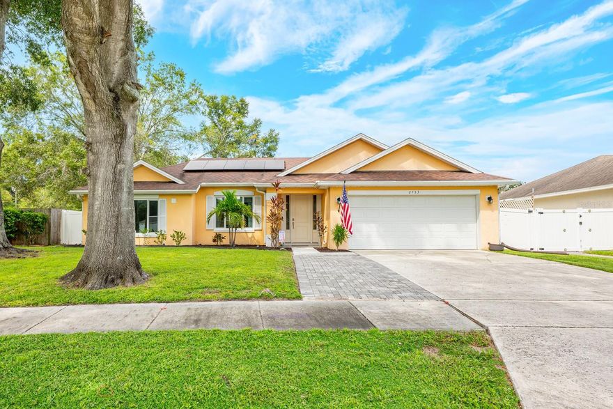 Ask about a lender provided rate buy-down credit on this home! ***Welcome to Waterside and this 3-bedroom, 2-bath POOL HOME that combines thoughtful upgrades with all the comforts of home in a convenient location! Tucked away in a friendly, established community with a LOW HOA, this SPLIT BEDROOM floor plan checks all the boxes for relaxed Florida living. The interior delivers FRESH PAINT (2025) and an inviting layout featuring LUXURY VINYL PLANK flooring in the family room and guest bedrooms (new in 2025), and TILE THROUGHOUT the rest of the home – no carpet anywhere! Perfectly situated in the heart of the home the modern kitchen offers the home chef solid wood cabinetry, subway tile backsplash, STAINLESS STEEL APPLIANCES, a breakfast bar, and a casual dining nook. The kitchen seamlessly flows into the bright family room, where a fireplace adds warmth and charm, while formal living and dining areas provide additional space for entertaining. The layout of the bedrooms offers privacy and flexibility, with a generous PRIMARY SUITE that includes a WALK-IN CLOSET and well appointed en-suite bath. Two guest bedrooms are positioned on the opposite side of the home with easy access to a shared full bath. After you are done exploring the inside of this beautiful home, step outside to your personal backyard retreat – FULLY FENCED with no rear neighbors, creating a peaceful setting to enjoy the SCREENED POOL and lanai. Whether you are relaxing with a book or hosting a weekend barbecue, this space delivers the indoor/outdoor lifestyle you have always dreamed of. Other updates include ***OWNED SOLER PANELS*** to keep energy costs low, NEWER WINDOWS, and new irrigation control valves and heads (2025) for peace of mind. All of this, conveniently located just minutes from major roadways, shopping, dining and ZONED FOR A-RATED OCOEE HIGH SCHOOL. From sunny pool days to cozy nights by the fire, this home is ready to elevate your everyday – call today to schedule a tour!