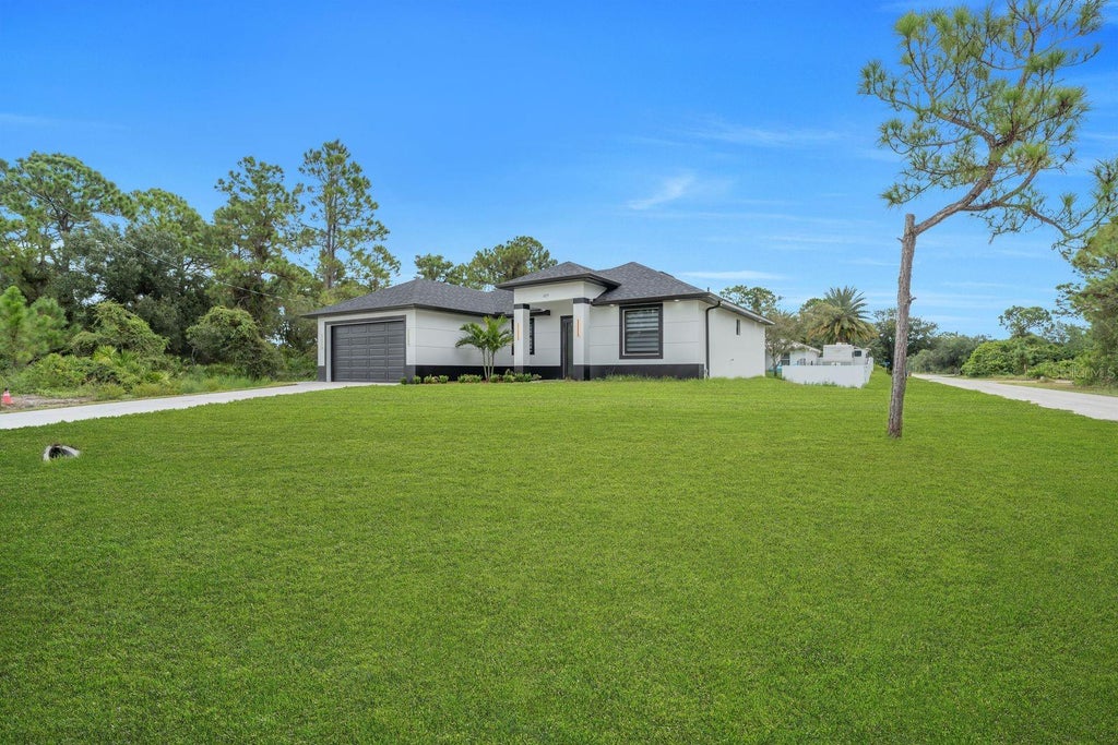 Photo of 325 Leruth Avenue, Lehigh Acres, FL 33974 (MLS # A4707173)