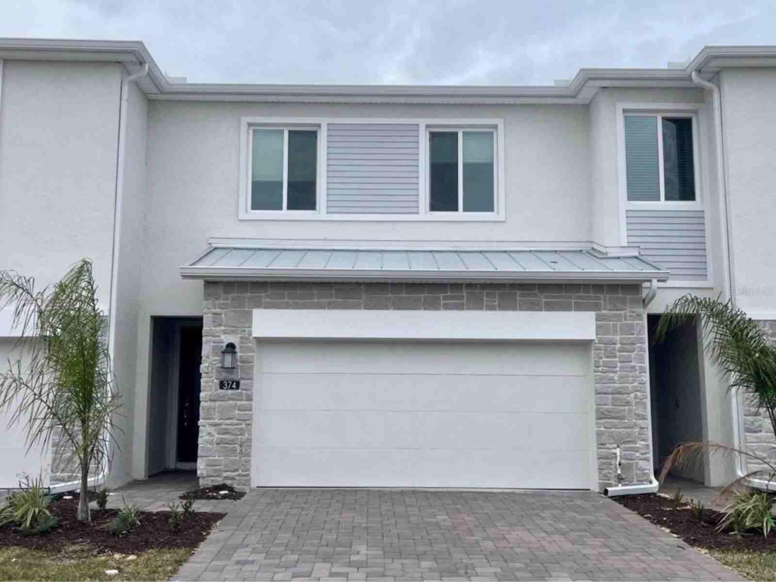 Welcome to your residence in Champions Gate, Florida, an elegant property ready to welcome its first occupant. This home features a spacious open floor plan, including a well-equipped kitchen and the convenience of a sizable 2-car garage. All three bedrooms are located on the second floor, including the luxurious owner's suite, which consists of a restful bedroom, an en-suite bathroom, and a walk-in closet. Strategically located, the property ensures quick access to major routes like I-4, US-27, and Highway 429, and is just minutes away from renowned golf courses, shopping at Posner Park, Disney Springs, and a variety of dining options. This townhome is not just a place to live but a gateway to a lifestyle of ease and sophistication.