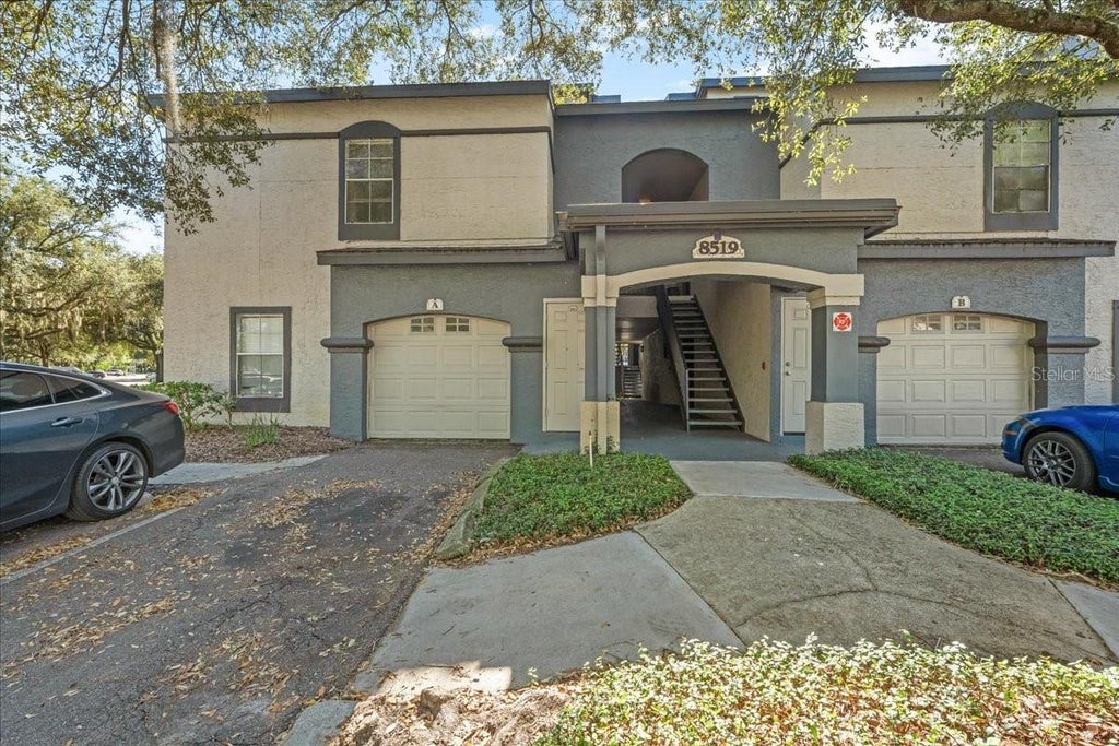 Photo of 8519 Island Breeze Lane #101, Temple Terrace, FL 33637 (MLS # TB8559102)