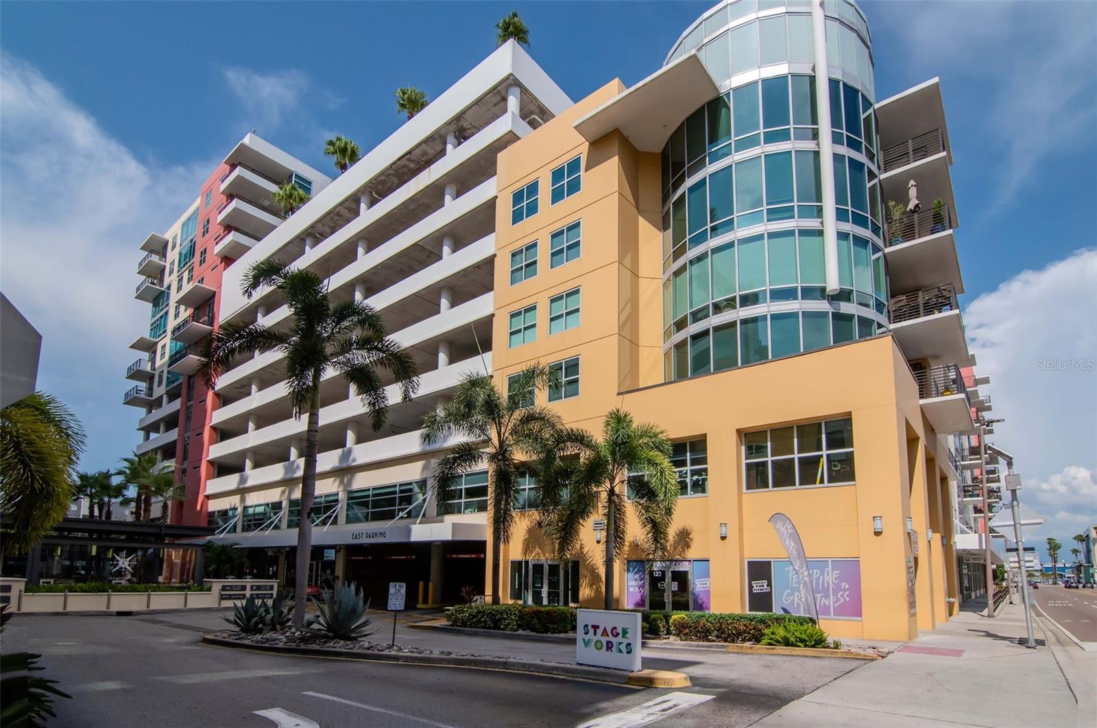 WHEN ONLY THE BEST WILL DO! Experience luxury living in the vibrant heart of downtown Tampa in Grand Central at Kennedy. This exceptional condominium is move-in ready with its professionally updated kitchen, flooring and interior paint. The gourmet chef's kitchen is a masterpiece, featuring custom contemporary cabinets, a grand quartz island with double waterfall edges, attractive backsplash, and newer stainless steel appliances featuring a gas stove, range hood, refrigerator, wine refrigerator, built-in microwave and dishwasher. The living space feels larger with floor-to-ceiling windows providing a picturesque view of the city and pool area below. The 9th-floor rooftop includes 2 pools and hot tubs, a state-of-the-art fitness center, cabanas, a grilling area, a guest-friendly clubhouse, lush green spaces, and a pet walk. This unit comes with a parking space in the gated garage below the building. Grand Central's HOA provides comprehensive services including 24-hour security and concierge, air conditioning, gas, water, sewer, pest control, and trash collection. Owners are responsible only for electric and Wi-Fi. Downstairs convenience also includes covered outdoor social areas, Crunch Fitness, award-winning Cena Italian Restaurant, Pour House, The Poké Company, Massage Envy, Gelato-Go, and Stageworks Theater. You’re also within walking distance to Publix Supermarket, Starbucks, salons, studios, dry cleaners, doctors, and dentists. Across the street, enjoy Pickleball Park and a dog park for outdoor fun. Located in the Channelside District, adjacent to the Water Street District, this prime location provides easy access to Publix, Madison Street Park, GreenWise Market, coffee shops, trolley access to Ybor City, Sparkman Wharf, Amalie Arena, and the Tampa Riverwalk.