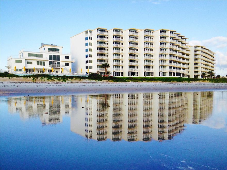 An exceptional opportunity awaits with this DIRECT OCEAN FRONT CONDO, lovingly maintained through generations of single-family ownership. This 2-bedroom, 2-bath condo offers unobstructed ocean views along with a well-maintained interior with thoughtful updates, including an in-unit washer and dryer for added convenience and new A/C 07/25. No upcoming special assessments and reserves are fully funded for added peace of mind. Community amenities include an oceanfront geothermal heated swimming pool for year-round enjoyment, clubhouse, tennis and pickleball courts, shuffleboard, and a grill area—all within a well-maintained gated community. Located just minutes from JB’s Fish Camp, the Canaveral National Seashore, and a short drive to Flagler Avenue and historic Canal Street, where you can enjoy live music, restaurants, shops, and art galleries. New Smyrna Beach is also conveniently located near Central Florida’s world-famous attractions, the Daytona Speedway, and three airports. Don’t miss out on this rare opportunity to own a direct oceanfront gem in one of the area’s best kept secrets!