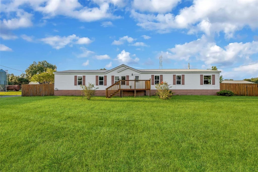 Photo of 3858 E Knights Griffin Road, Plant City, FL 33565 (MLS # TB8537670)