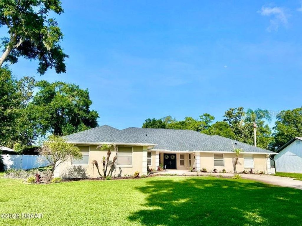 Photo of 123 Rio Pinar Drive, Ormond Beach, FL 32174 (MLS # V4949287)