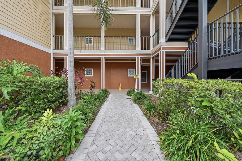 Photo of 9051 Treasure Trove Lane #104, Kissimmee, FL 34747 (MLS # O6419077)