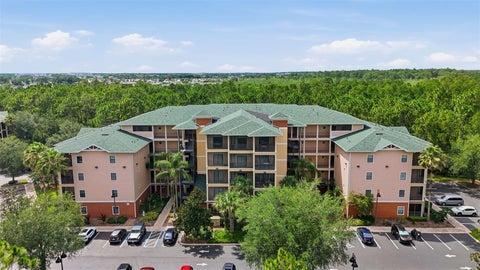 Photo of 9051 Treasure Trove Lane #104, Kissimmee, FL 34747 (MLS # O6419077)