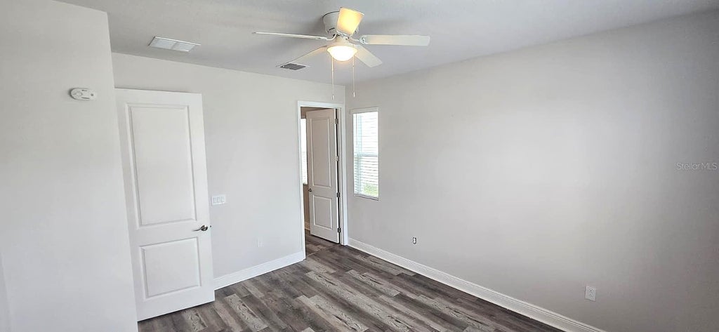 Photo of 1128 Sugarwood Street, Davenport, FL 33837 (MLS # O6449036)