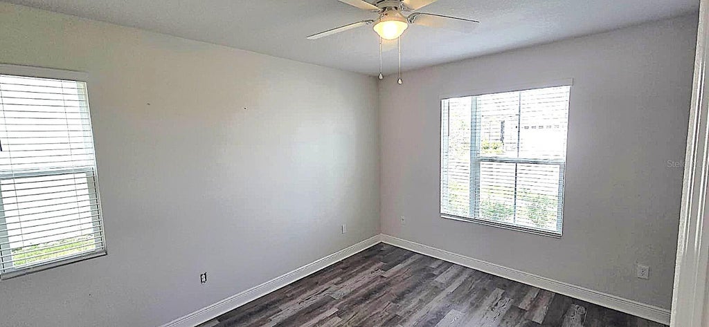 Photo of 1128 Sugarwood Street, Davenport, FL 33837 (MLS # O6449036)