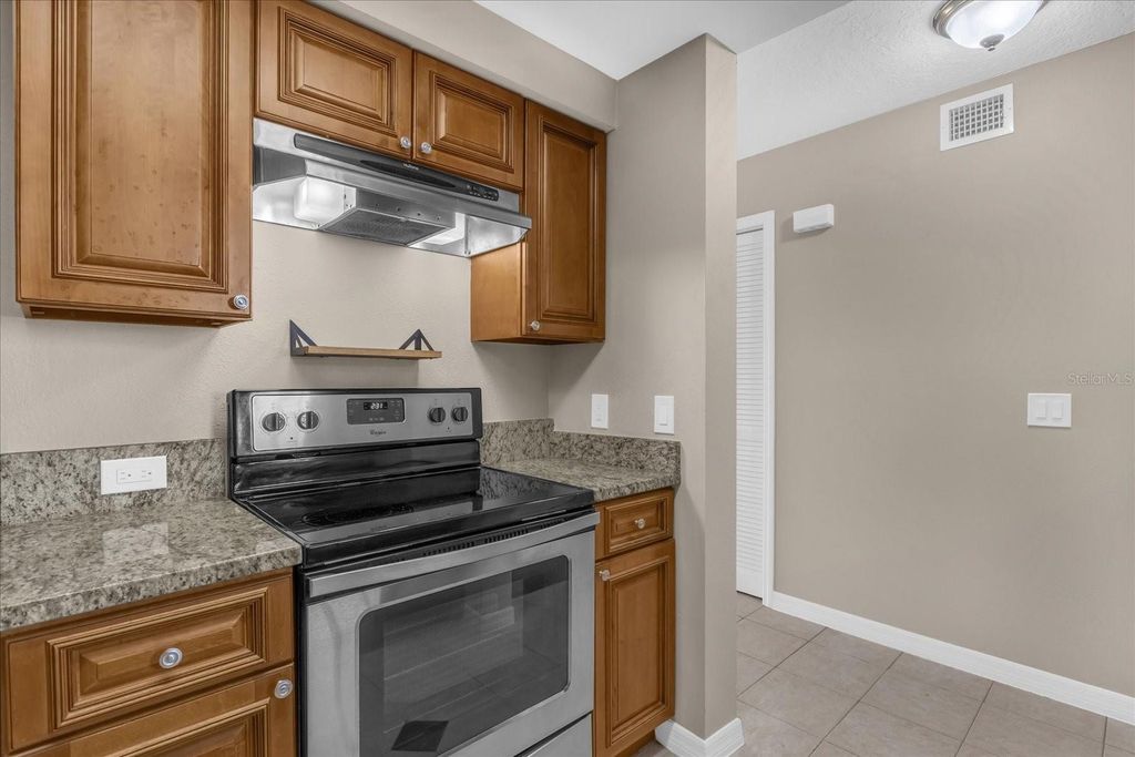 Photo of 4848 Marks Terrace #400, Orlando, FL 32811 (MLS # O6382929)