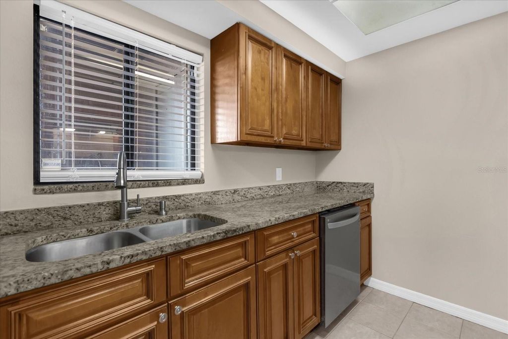 Photo of 4848 Marks Terrace #400, Orlando, FL 32811 (MLS # O6382929)