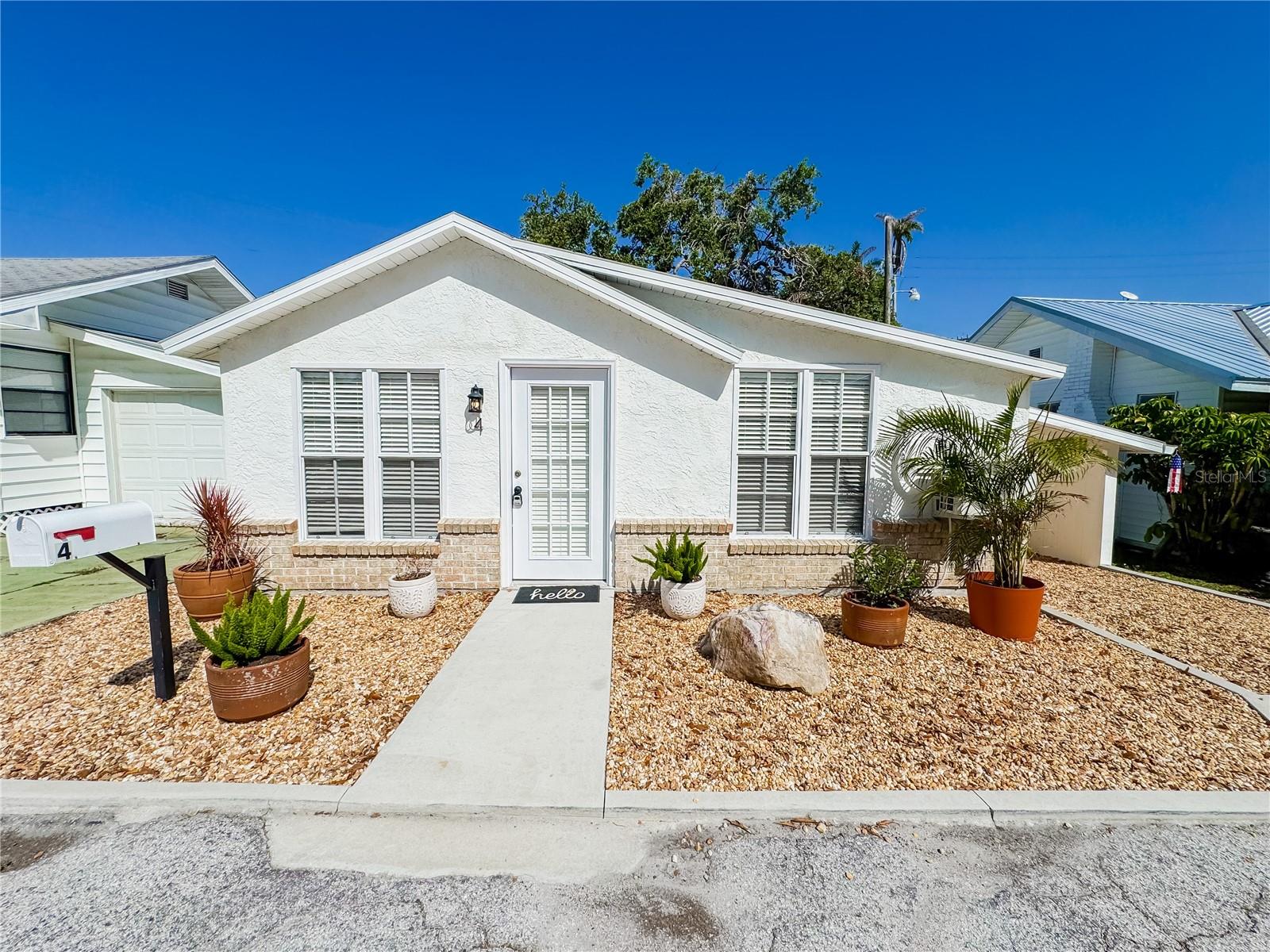 Back on the Market! Nestled in the heart of the historic 55+ community of Braden Castle, this home is where 'the good old days' meet 'the best is yet to come.' This two bedroom, one bath house is a fusion of character, charm and fresh design perspective. No stone was left unturned in this renovation including a new A/C and duct work. The owners value and prioritize high quality finishes, which can be seen in this property with the selection of gorgeous quartz countertops, brand new luxury vinyl plank flooring, and porcelain backsplashes and shower tiles. The neighborhood is notably known for its 150+ year old Braden castle ruins central to the community and its 700 foot pier that extends into the Manatee River. This refreshed house is looking for someone to make it their forever home.