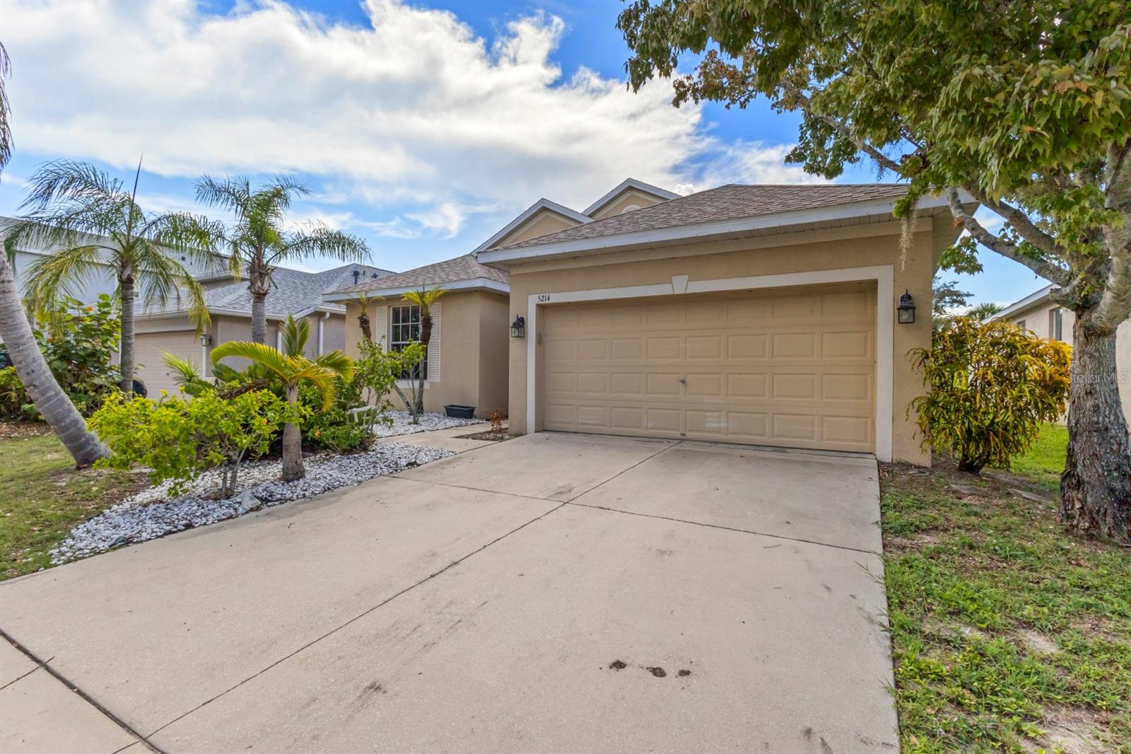 Welcome to this well-maintained 3-bedroom, 2-bath home located on a conservation lot with tranquil pond views. This split-bedroom, great room floor plan features laminate wood flooring in the main living areas and owner's suite. The kitchen opens to the great room and includes 42" maple cabinets, beveled-edge countertops, and all appliances. French doors in both the great room and owner's suite lead to a covered, screened lanai, perfect for relaxing or entertaining. The spacious owner's suite offers a walk-in closet, garden tub with separate shower, dual sinks, and a raised maple vanity with cultured marble countertop. Additional features include tile flooring in both bathrooms, an indoor laundry room with, and utility tub, garage with pull-down attic stairs, ceiling fans, blinds, and a security system. Located in a gated community with pool and tot lot, and minutes from E.G. Simmons Park with beach access, boat ramp, and fishing. Easy access to major highways for commuting.
