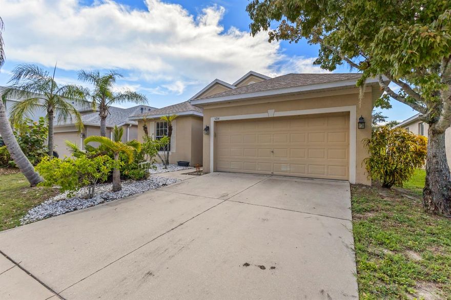 Welcome to this well-maintained 3-bedroom, 2-bath home located on a conservation lot with tranquil pond views. This split-bedroom, great room floor plan features laminate wood flooring in the main living areas and owner's suite. The kitchen opens to the great room and includes 42" maple cabinets, beveled-edge countertops, and all appliances. French doors in both the great room and owner's suite lead to a covered, screened lanai, perfect for relaxing or entertaining. The spacious owner's suite offers a walk-in closet, garden tub with separate shower, dual sinks, and a raised maple vanity with cultured marble countertop. Additional features include tile flooring in both bathrooms, an indoor laundry room with, and utility tub, garage with pull-down attic stairs, ceiling fans, blinds, and a security system. Located in a gated community with pool and tot lot, and minutes from E.G. Simmons Park with beach access, boat ramp, and fishing. Easy access to major highways for commuting.