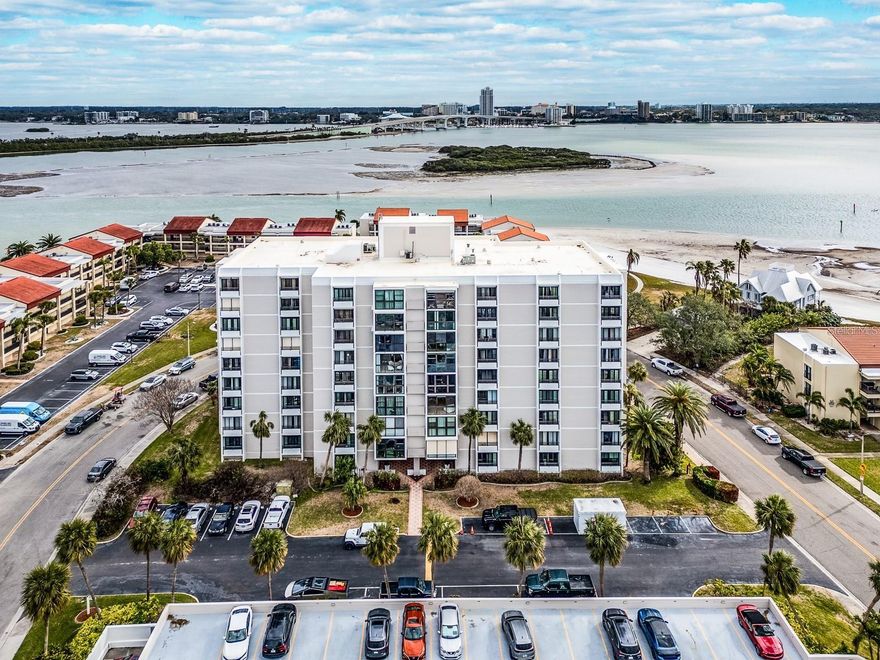 Spectacular views greet you the moment you walk in this beautifully updated condo! This Direct Gulf front, corner unit has Gulf and Intra-coastal views that are amazing. The seller has spared no expense with generous upgrades including marble floors throughout. This home has a spacious primary retreat with gorgeous bath updated with custom shower and vanity along with custom lighting. This bedroom has a sliding glass door with spectacular views. Both closets in both bedrooms have custom built shelving for ample storage. The guest bed also has slider with water views. Other upgrades to this home include, impact glass windows and sliders, ceiling popcorn removed, and skim coated, new refrigerator, washer and dryer, crown molding and doors. This unit is located in Clearwater Point, with 3 pools, spa and private beach. This community is located in Clearwater Beach with fine dining, shops, and our famous Clearwater Beach.