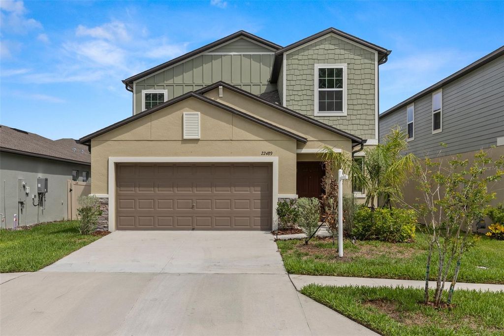 Photo of 22489 Storybook Cabin Way, Land O Lakes, FL 34637 (MLS # TB8390063)