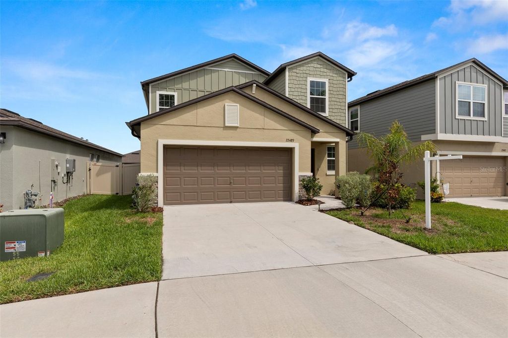 Photo of 22489 Storybook Cabin Way, Land O Lakes, FL 34637 (MLS # TB8390063)