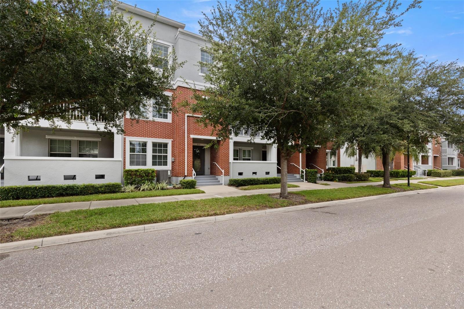 Gorgeous move-in-ready South Tampa Townhome Community located in North Hyde Park built in 2015. Minutes away from Downtown Tampa, University of Tampa, SoHo, Hyde Park Village, Tampa General Hospital-Davis Island, excellent schools, International Mall, I-275, Selmon Expressway and much more. This three-story solid block home has hurricane shutters, modern upgrades and stunning natural light! It's beautifully designed for privacy on first level with large bedroom, full bathroom and extra storage under stairway, the ideal space for working, learning or sleeping. Second floor opens to bright modern yet warm kitchen island with quartz counter tops, dining and family rooms as well as half bathroom. You will see many upgrades included, like stainless steel appliances, French Style refrigerator, 42-inch flat panel wood cabinets, 2-inch blinds, 12 x 24 tile in wet areas, wood floors throughout main areas of home on second and third floors, front load washer and dryer and water softener added in 2017. Third floor laundry room (Washer & Dryer included), master suite with double sinks and large walk-in closet, second bedroom with walk-in closet, full guest bathroom and third bedroom window has lovely view of downtown. This large townhome also offers extra storage with walk-in kitchen pantry and huge closet in 2 car garage. What is there not to like? Stop your search now and come take a look! Text or call to book an appointment.