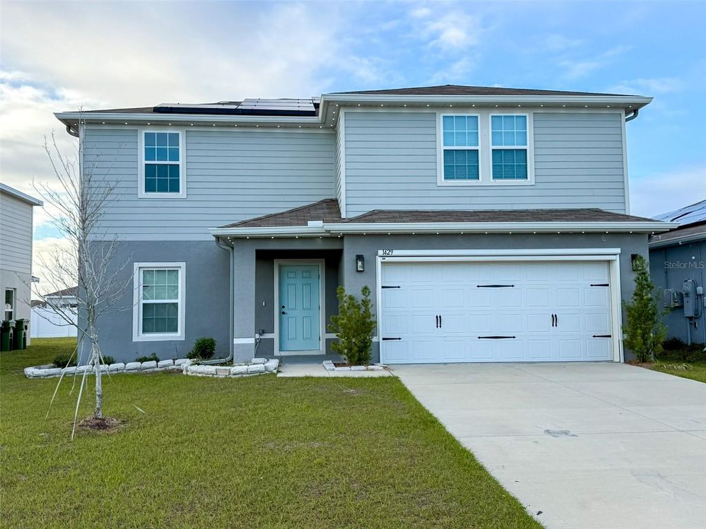 Photo of 1429 Feather Lane, Winter Haven, FL 33880 (MLS # L4960016)