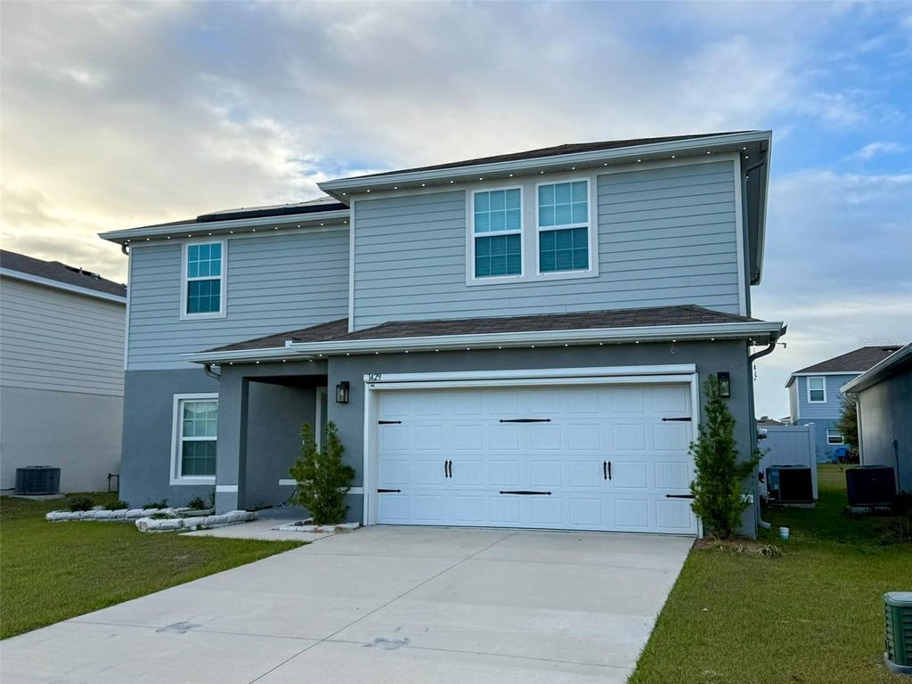 Photo of 1429 Feather Lane, Winter Haven, FL 33880 (MLS # L4960016)