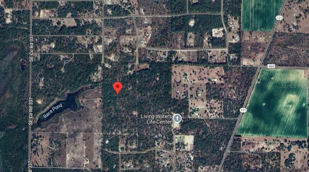 Looking to escape to a serene, "pure country" lifestyle? This parcel offers just that—nestled off the beaten path with no deed restrictions, no HOA, and agricultural rural residential zoning. You can set up a manufactured or site-built home of your choice. Create your own paradise by planting a garden, bringing chickens, goats, and pets. Enjoy convenient access to Dunnellon, Ocala, and Gainesville, while Williston is close for grocery shopping, feed stores, and hardware. Explore a range of outdoor activities nearby. MAPPING BUTTON SHOWS EXACT COORDINATES AND LOCATION
Access from SE 122nd Ave to SE 121st Terrace. Roads are dirt or gravel, steadily developing.