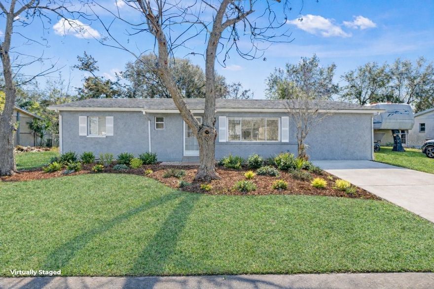 One or more photo(s) has been virtually staged. Welcome to this newly updated 3-bedroom, 2.5-bath home in the heart of Spring Hill. With 1,144 square feet of thoughtfully refreshed living space, this property blends modern updates with everyday comfort.Step inside to find brand-new flooring throughout and a completely updated kitchen featuring new cabinetry, countertops, and a clean, contemporary design. The open living and dining areas feel bright and inviting, creating the perfect space for relaxing or entertaining.The split-bedroom layout offers privacy, while the primary suite includes a walk-in closet and its own private bath. Both bathrooms have been refreshed to complement the home’s modern feel.Situated on a 7,500 sq ft lot, the backyard provides plenty of room to personalize — whether you envision a garden, play area, or outdoor entertaining space. With no HOA, central air, inside laundry, and a convenient location near schools, shopping, and major roadways, this move-in-ready home checks all the boxes.Don’t miss your opportunity to own a beautifully updated home at an affordable price — schedule your private showing today!